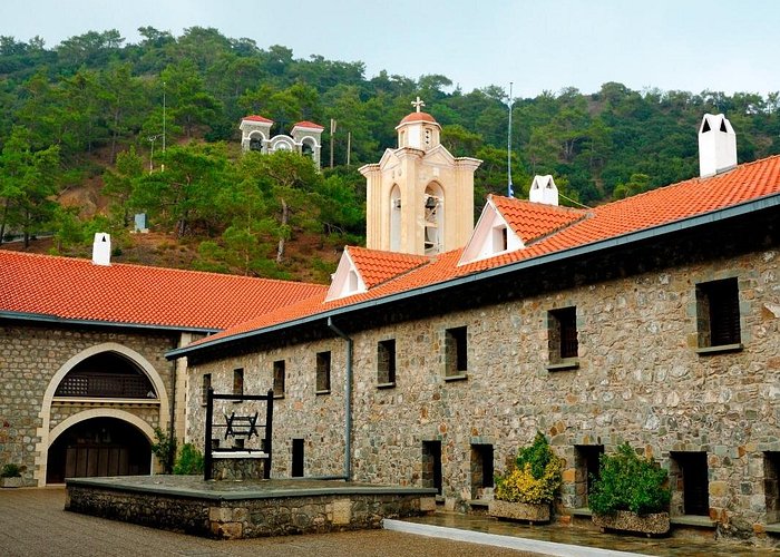 Panagia Chrysorroyiatissa Monastery near Panagia village in Paphos, Cyprus, surrounded by the scenic slopes of the Troodos Mountains.