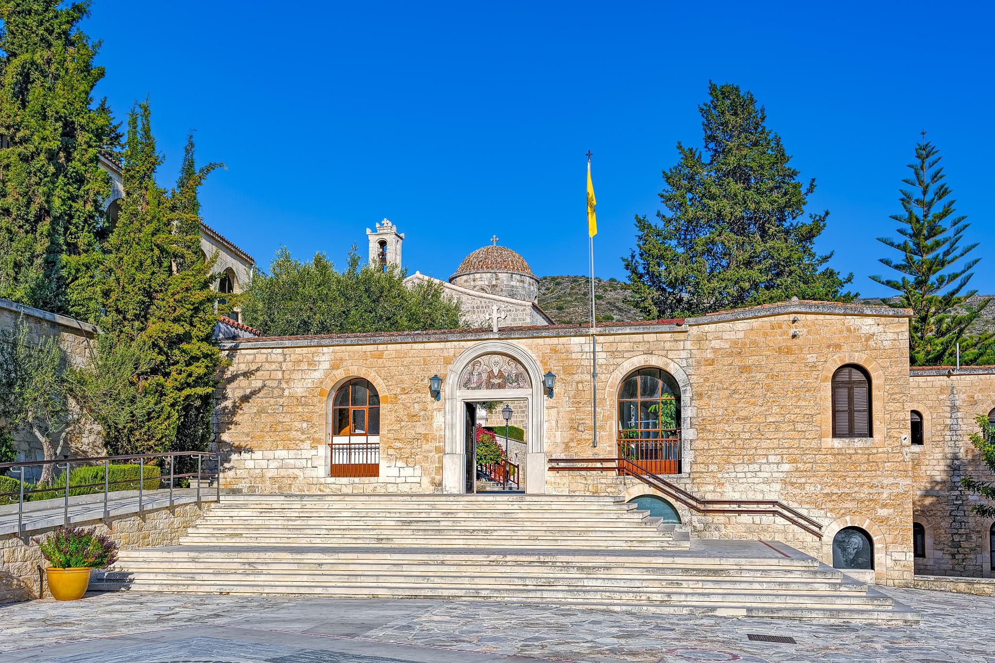 Agios Neophytos Monastery near Tala in Paphos, Cyprus, with its historic monastery buildings and mountain landscape.